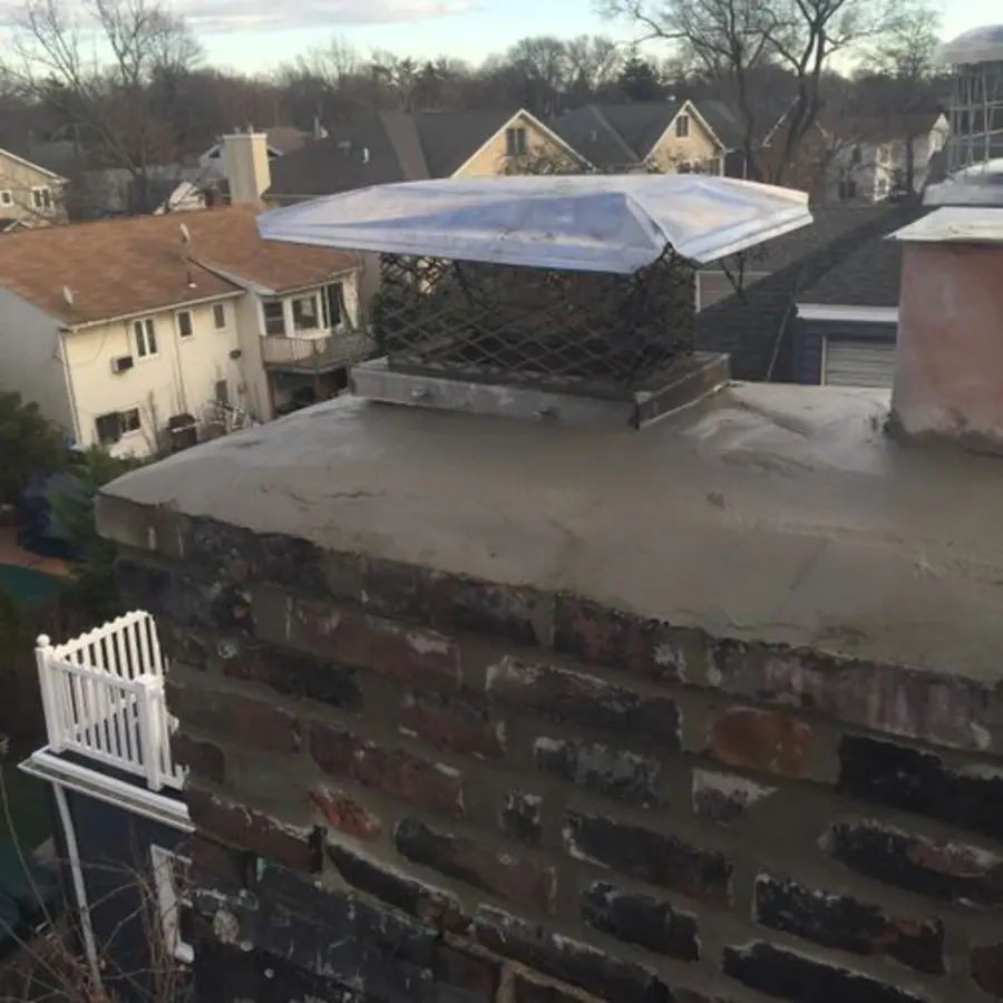 Repaired chimney masonry and crown