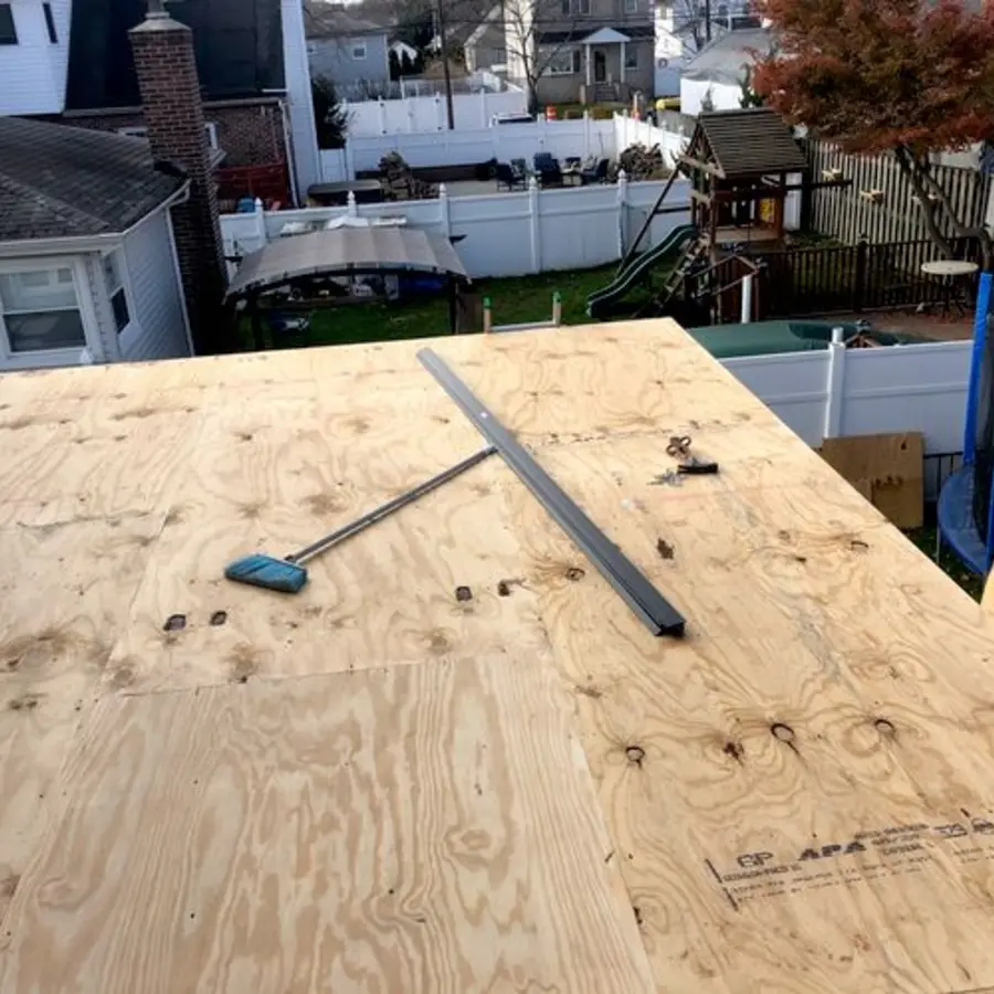 Exposed roof decking before flat roof installation
