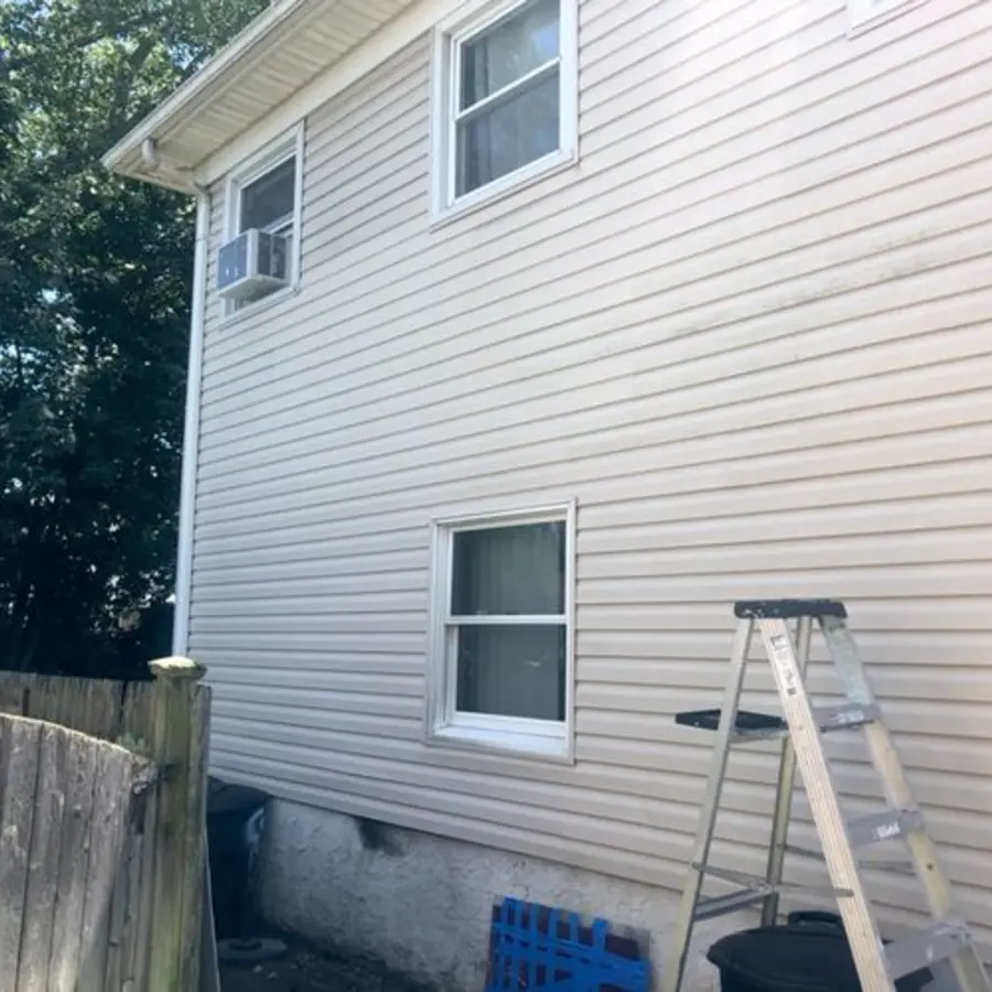 Restored exterior siding after repair